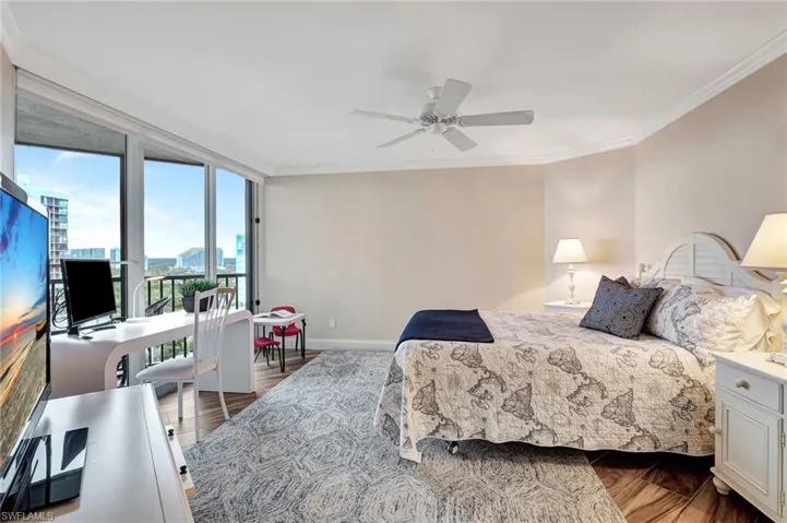 Main Bedroom featuring ceiling fan and crown molding