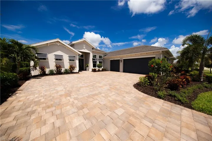 View of front of house with a 3 car garage