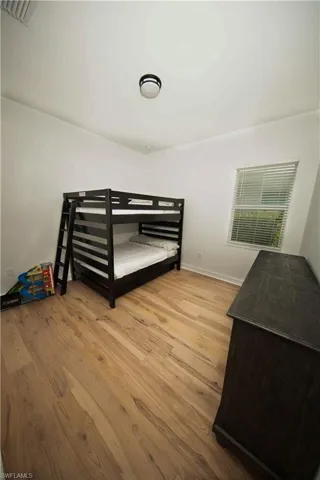 Bedroom featuring light hardwood / wood-style floors