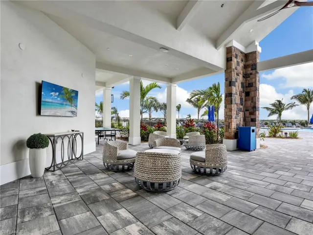 View of patio with a water view