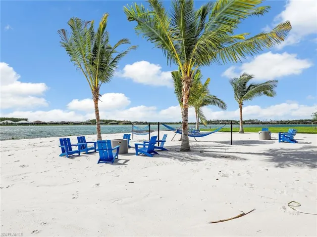 View of community featuring a view of the beach and a water view