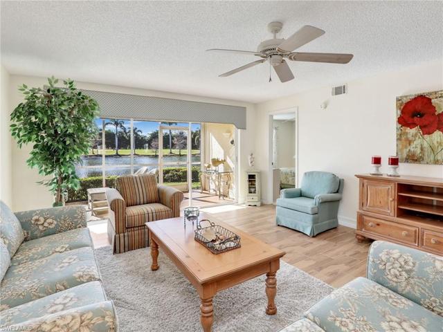 Living Area W/ Sliders To The Lanai & Beautiful Views