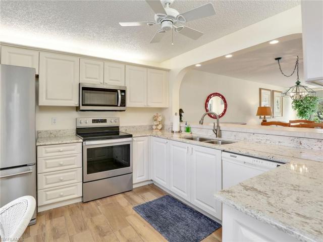 Upgraded Kitchen Offering Granite Counters & Refaced Cabinets