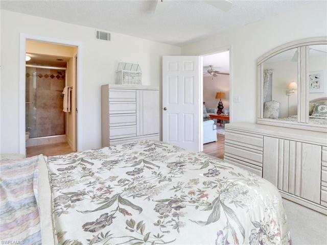 Primary Bedroom & Bathroom W/ Door To The Living Area