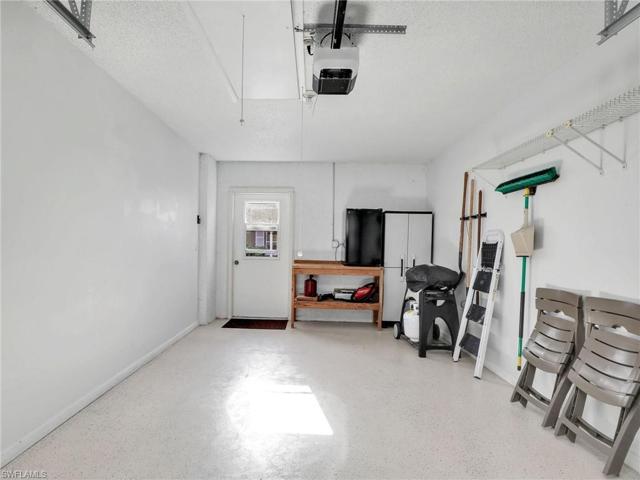Inside Detached Garage - Epoxy Garage Floor, Work Bench W/ Mini Fridge & More