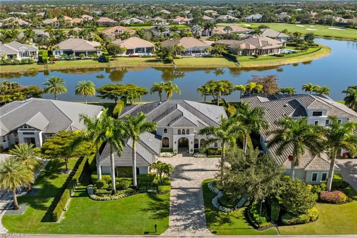 Aerial view of residential area with a nearby body of water