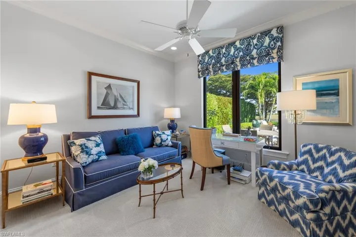 Home office with crown molding, recessed lighting, a ceiling fan, and carpet