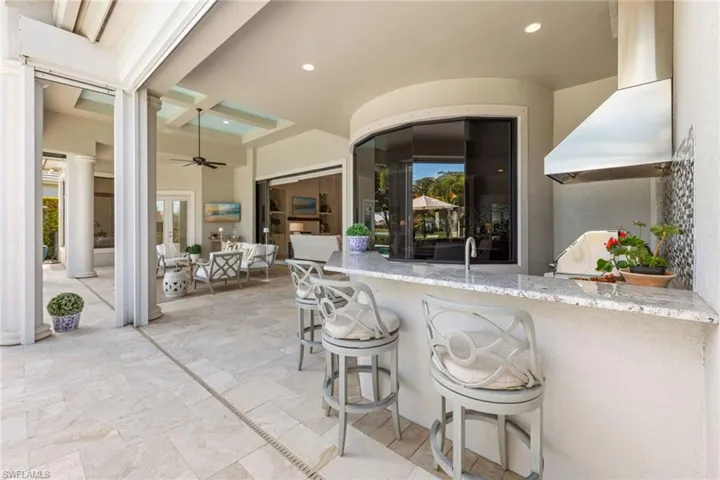 View of patio featuring ceiling fan