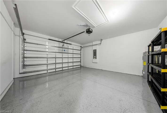 Garage featuring electric panel
