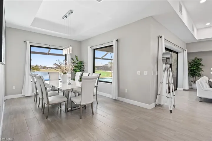 The dining area has glorious views of the water and directly behind it the sunset!