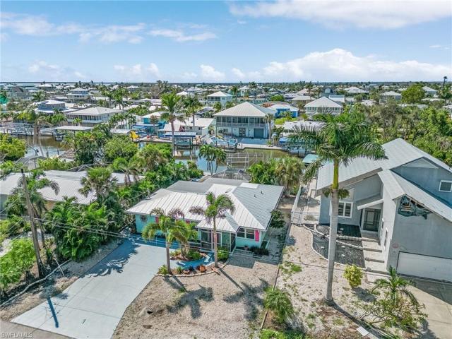 Current aerial of home looking West.