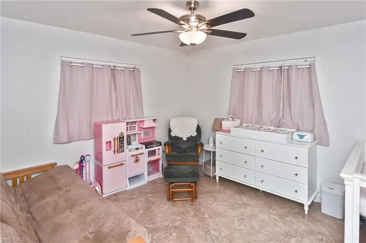 Game room featuring ceiling fan