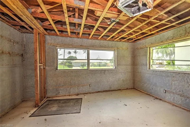 Miscellaneous room featuring a wealth of natural light and concrete floors