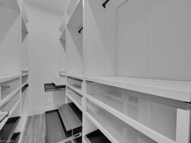 Custom Features In Walk-In Closet