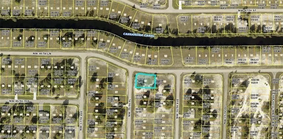 Aerial overview of property's location with property parcel outlined
