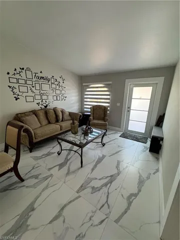 View of tiled living room