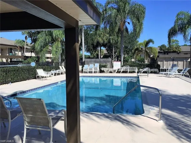 View of swimming pool with a patio area