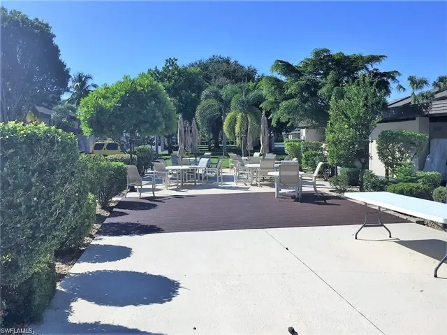 View of home's community with a patio area