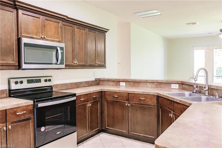 ALL NEW APPLIANCES & PLENTY OF CABINETS TO ACCOMMODATE YOUR LARGE FAMILY!