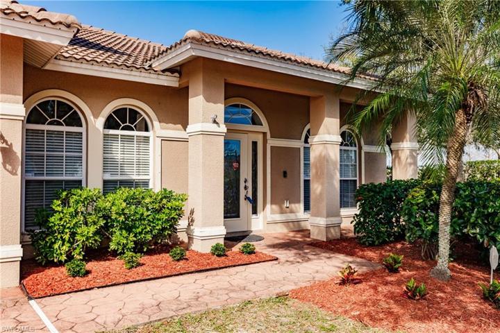 BEAUTIFUL LANDSCAPING & COVERED ENTRYWAY!