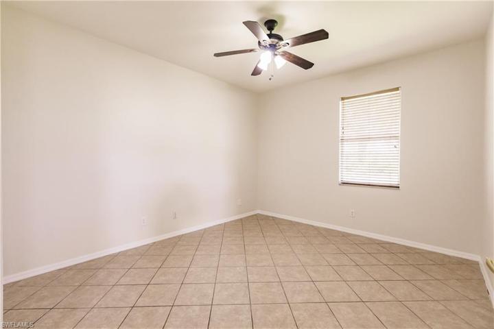 THIS IS THE 1ST GUEST BEDROOM AS YOU ENTER THE HOME! IT COULD BE USED AS A "MOTHER-IN-LAW" SUITE! IT ADJOINS THE LARGE LIVING ROOM/DINING ROOM CREATING A PRIVATE AREA TO ENJOY!