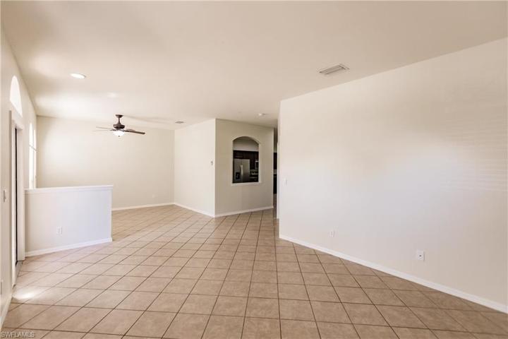 ANOTHER VIEW OF THE LIVING ROOM TOWARDS THE FORMAL DINING ROOM!