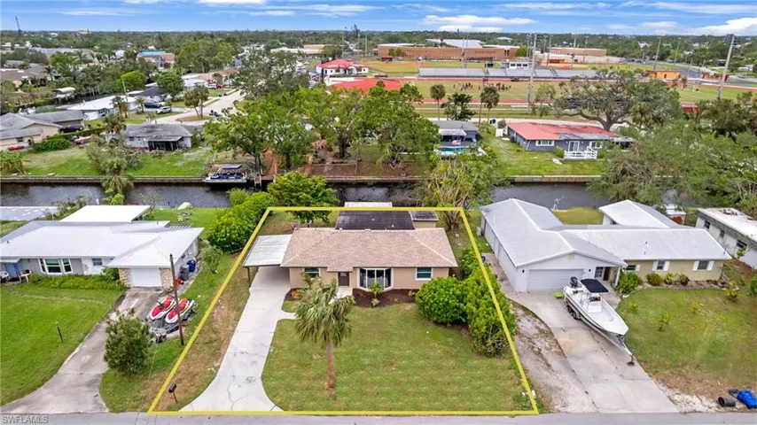 Home has an expansive Driveway that can fit multiple cars.