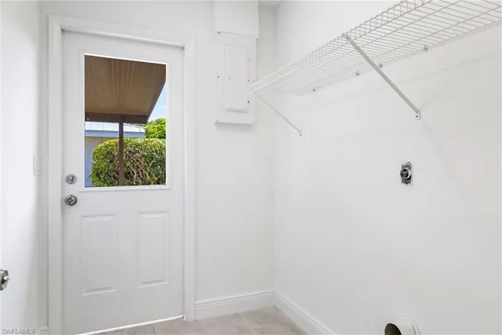 The Laundry Room has its own Exit Door to the carport and is just off of the kitchen.