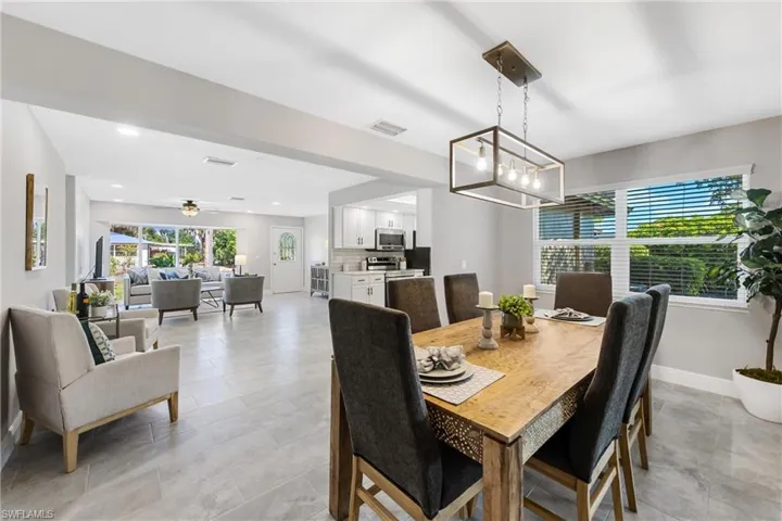 The Dining Room easily fits a large table & even has direct water views.