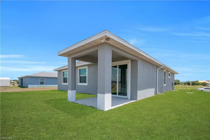 Covered patio with a smooth concrete surface