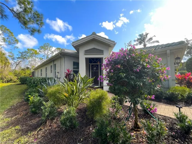 View of front entryway featuring stucco siding