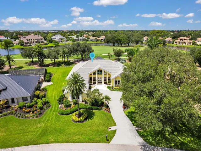 Aerial view of residential area with a large body of water