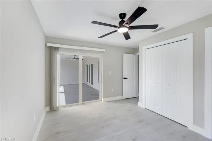 optional second owner's suite with private bath and lanai access/segundo dormitorio principal con bano privado y acceso a la terraza