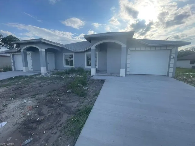 Single story home with a garage