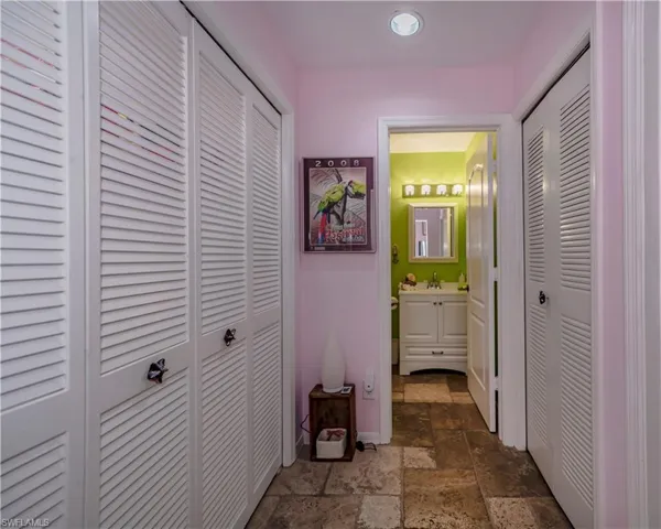 Hall with tile floors and sink