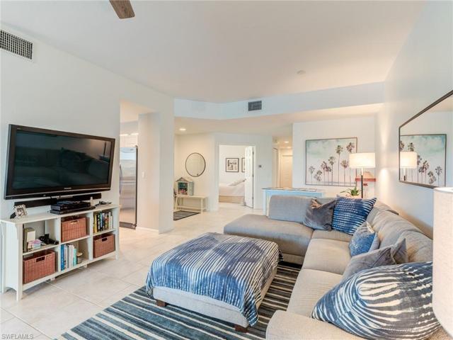 Entry door is to the left of French doors to the den.  Den is currently furnished as a bedroom