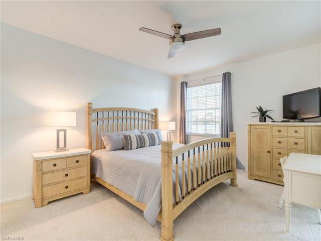 Primary bedroom with a lake view