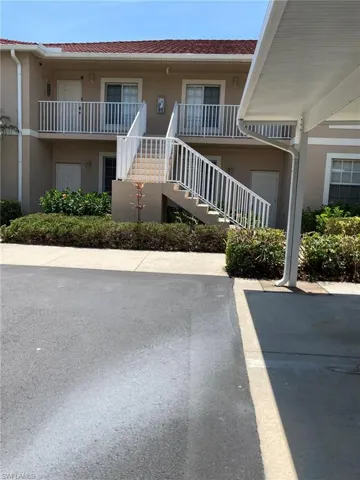 View of building exterior featuring stairs