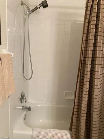 Bathroom featuring shower / bath combo