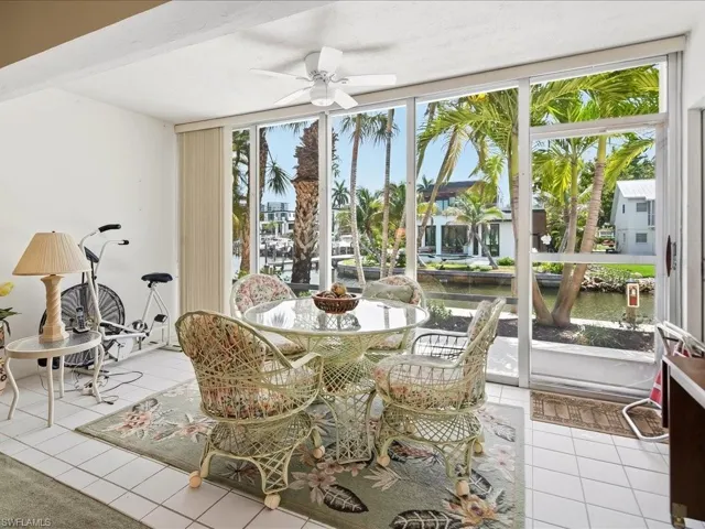 Glass-Enclosed Lanai Overlooking Dock & Canal