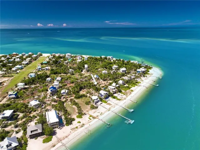 Bird's eye view with a beach view and a water view