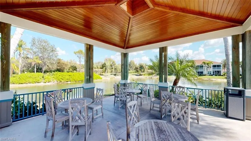View of patio / terrace featuring outdoor dining space and a water view