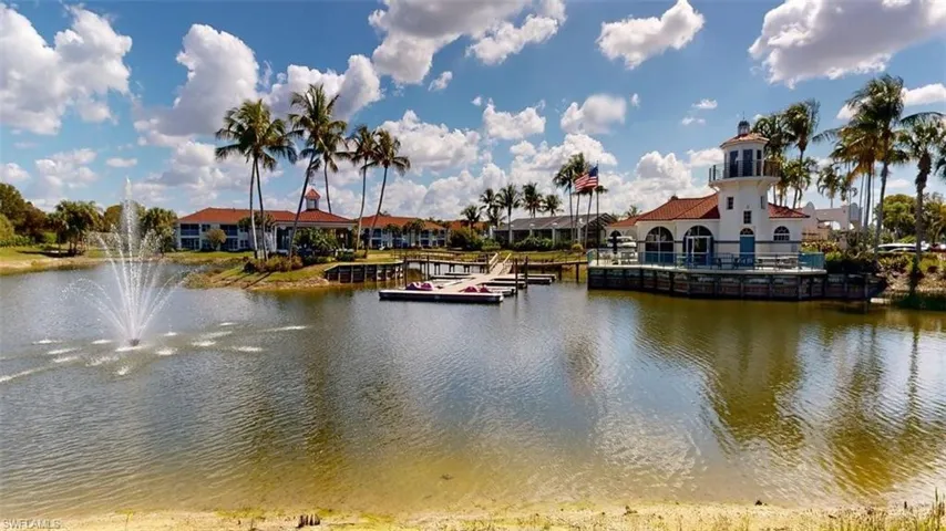 Water view with a floating dock