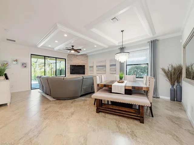 Dining area featuring recessed lighting, visible vents, crown molding, and baseboards