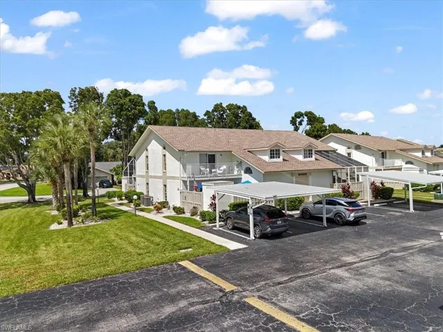 Covered parking lot with a residential view