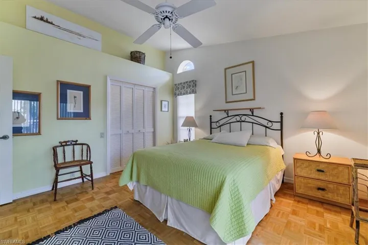 Bedroom featuring a closet and a ceiling fan