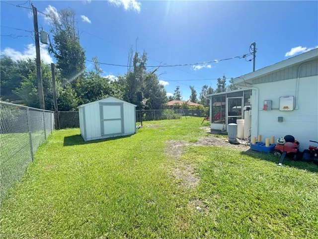 View of yard with a shed