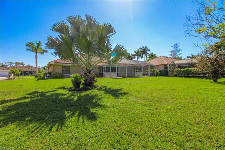 View of yard featuring a lanai