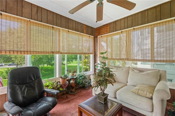 Sunroom featuring carpet flooring and New Windows.