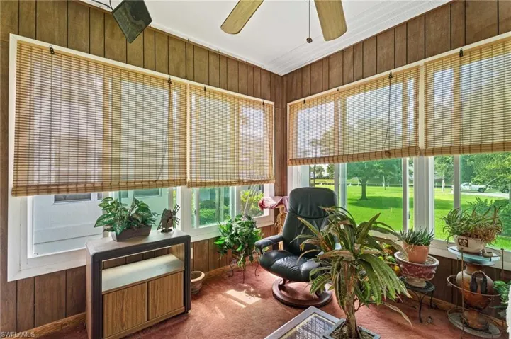 Sunroom overlooks Lawn and in the distance the Gulf Access Canal.